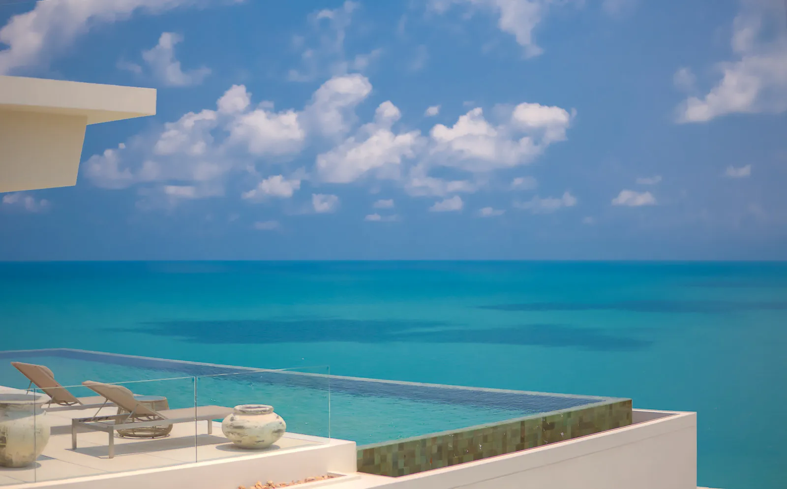Ceramic feature pot beside infinity pool with island vista, Koh Samui