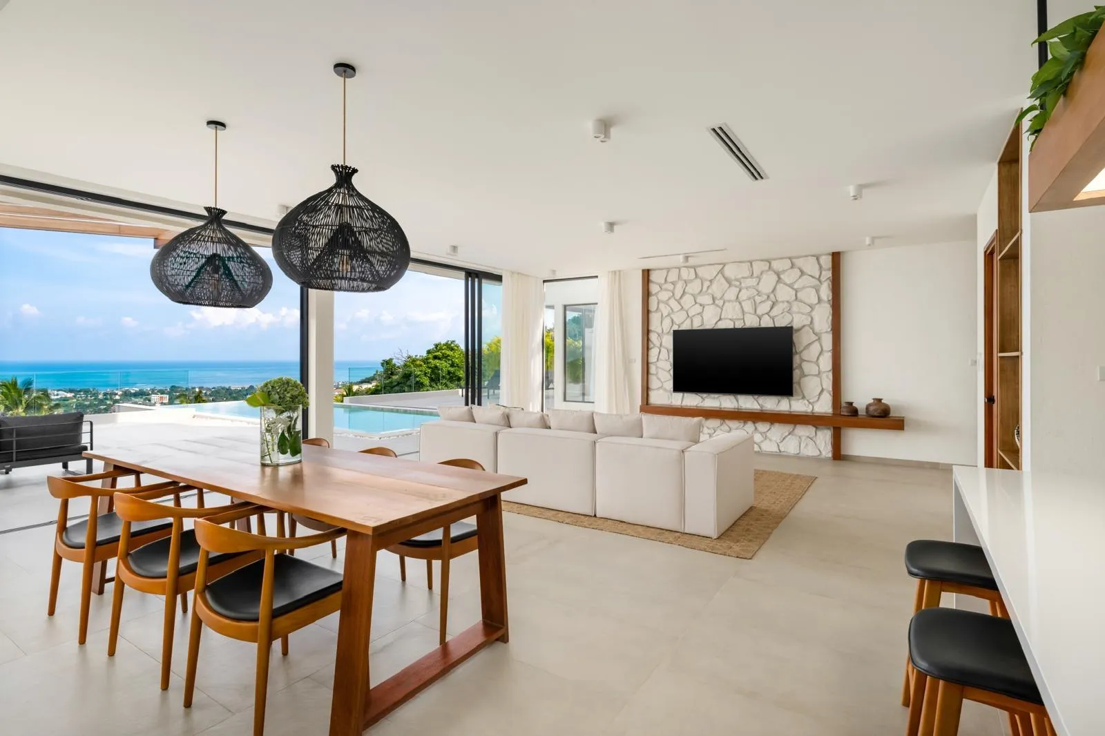 Interior living room with sea view through floor-to-ceiling glazing, Chaweng Noi, Koh Samui